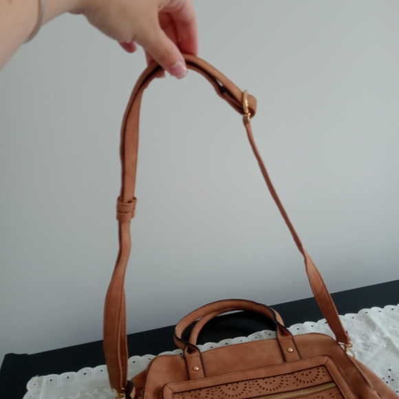 Rosetti Tan with a design also has a long strap pocketbook. - Picture 4 of 9
